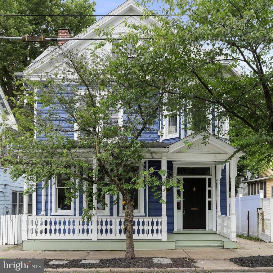 Charming historic home in Martinsburg near downtown. Features wood floors, updated laminate in kitchen and lower bath, an open fireplace (inspection needed), and a versatile upper-level bonus room. Spacious walk-up attic for additional potential usable space and a side covered porch leading to a large, level backyard.