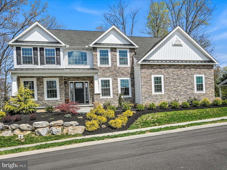 Welcome Home to 105 Hickory Drive, a two year young home located in Norwegian Woods.  Boasting over 3500 square feet it offers a lifestyle of quality and style. High ceilings and windows allow an abundance of natural light to flow through that adds to the spaciousness.  Offering 4 bedrooms and 3.5 baths on a 0.6 acre lot this home has ample space for comfortable living.  The kitchen is a highlight of the home offering ample cabinet space, granite counters with a large island, a sun soaked breakfast room and all appliances included. The kitchen flows openly into the 2 story family room that features a stone gas fireplace.   A formal living and dining room,  home office,  half bathroom and laundry room (upgraded cabinets and sink) round out the first floor.  The upper level has three proportionally sized bedrooms  (3rd bedroom has a full bathroom) and an impressive primary suite with two closets and sitting area.  Home also has a convenient two zoned heating system, generator tied into primary and plenty of storage space. A two-car epoxy coated garage and driveway allows plenty of parking options. Your tastefully landscaped lot offers an ideal space for relaxation and outdoor entertaining. This premier development is a convenient location for shopping, commuting and schools.  Don't miss out on the opportunity to make this your home -Call for a list of all upgrades-too many to list!