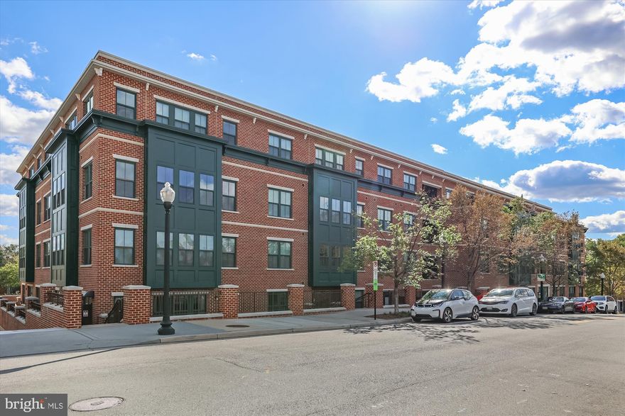 Open House 4/12 2-4pm* Unobstructed DC Monument views! Corner unit with tons of natural lights and DC views AND 2 garage parking spaces! Upon entry, the foyer greets you with multiple closets for storage,  hardwood floors, granite counters, stainless steel appliances, very lightly lived in, gas cooktop (gas in included in the condo fee), wall oven, pantry cabinet, and an open floorplan with the kitchen overlooking the living room. The primary bedroom has carpet, walk-in closet, and large windows. The 2nd bedroom has a generous closet, sound protection decor on the wall, and large window overlooking the common terrace. The bathroom features a tub/shower. There's a washer/dryer in unit. The building features a community room, large open terrace with seating and grills, ample guest parking, and steps away from Safeway, Dunkin Donuts, Italian Store, Coldstone, Starbucks, and just a few blocks away from Cafe Colline, and other Lee Heights shops. There's a bus stop in front of the condo for your commute into DC or the bike trail, or if you're driving, hop right onto 66. Improvements include shades/blinds in 2024, custom shelving in closets in 2024. Less than 1 mile to Ballston Quarter!