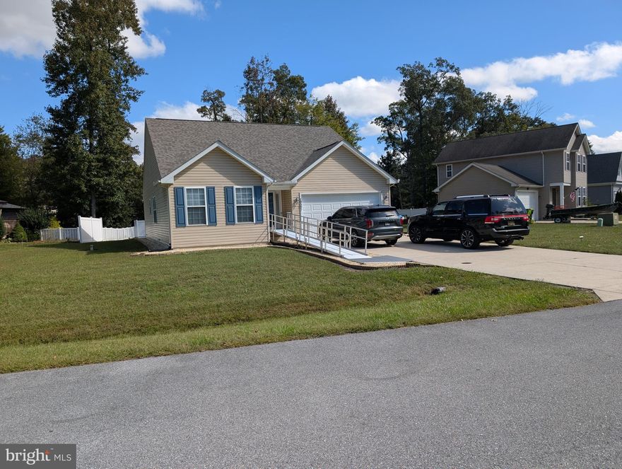 Welcome to this well‑maintained, single‑story residence offering  1,620 sq ft of comfortable living space. This home features a two‑car attached garage, open floor plan, and a large lot ( 9,583 sq ft) that offers both privacy and outdoor potential. This lovely 3 bedroom 2 bathroom home is in the neighborhood of Woods at Wall Creek.  Located only minuets away from the Golf course. Close to shopping and Restaurants in Georgetown and Millsboro. Agent is related to the Seller.