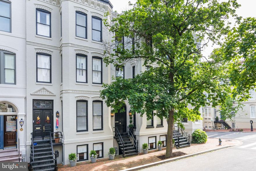 Beautifully restored 4BR/4.5 BA East Village home perfect for entertaining! The main level features a sun-filled Living Room and Dining Room with exquisite hardwood floors, custom built-ins,  and designer finishes. The gourmet Kitchen has a large center island, marble countertops, and stainless steel Wolf appliances.  Upper Level 1 offers a luxurious Master Suite and a Sitting Room complete with an indoor coffee or drink bar with wine cooler, and an outdoor balcony overlooking the Patio. Upper Level 2 has 2 more large Bedrooms with en-suite baths. The basement level is provided with its own entrance and gives access to a charming rear Patio. This home is an entertainer or architect's dream.