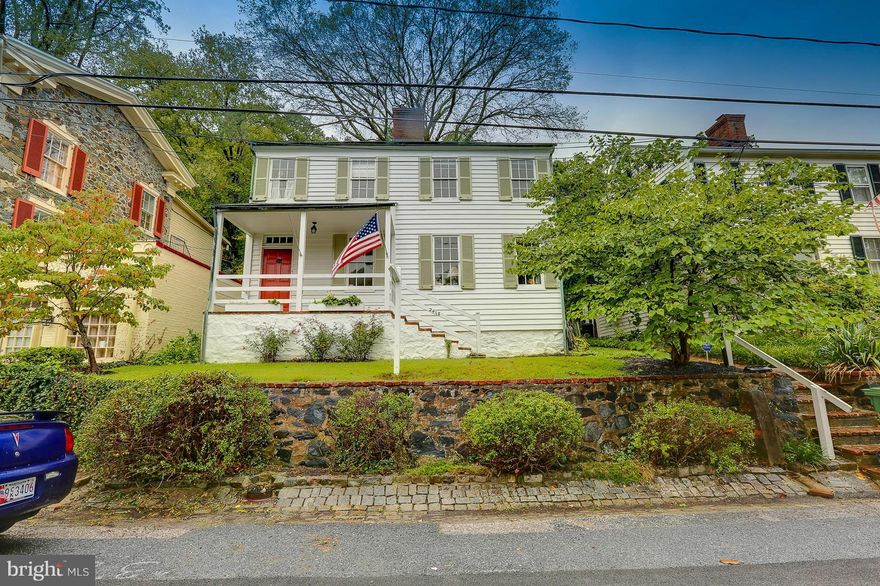 This very distinguished Colonial is the best buy in,Historic Dickeyville. Comes with an xtra lot & 1 Car detached garage. It was converted to gas in '2015 wi/ choice of electric or gas hook-ups New top-grade,high-efficiency gas furnace. New architectural grade roof.Recently upgraded electrical panel.View the Gwynn Falls from your portico.  Priced to sell. Won't last long. HURRY!!