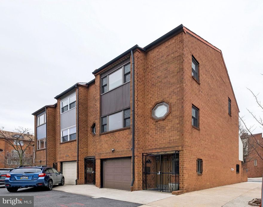 Welcome to 1 Queen Street, Unit #1, located in the highly sought-after Meredith Catchment in Queen Village. This 3-story end-unit townhome offers 3 bedrooms and 2.5 baths, with numerous upgrades throughout, including a kitchen renovation in 2022, upgraded windows and sliders, and a prime corner location. Enter through a private security gate into the welcoming front hall, featuring ample closet space, a convenient half bath, and laundry. The well-appointed kitchen is ideal for both everyday living and entertaining, with direct access to a charming patio—perfect for your morning coffee. The spacious living room offers a comfortable setting to relax, complete with sliders leading to a deck for seamless indoor-outdoor living. This level also includes a full hall bath and a generously sized bedroom. Upstairs, you’ll find two spacious bedrooms with cathedral ceilings and a full hall bath. The primary bedroom features closets with custom organizers and a loft space, ideal for additional storage. Freshly painted and move-in ready, this home offers quality finishes and thoughtful design throughout. Additional highlights include direct access to the garage for added convenience. Enjoy all that Queen Village has to offer, with neighborhood dining, shops, and the riverfront just a short walk away—making this location as convenient as it is charming.