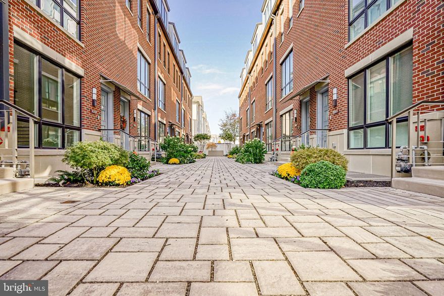 WE CAN OFFER PREFERRED LENDING TO QUALIFIED BUYERS THROUGH MOVEMENT MORTGAGE.
A SPECIAL RATE OF 5.875%, 30 YEAR FIXED,, PERMANENT FINANCING IS AVAILABLE. CALL FOR DETAILS. 
It's that time of year! Dive right into Philly living with an advanced peek – Yo, you got a FULL TEN YEAR TAX ABATEMENT waiting for ya!

Welcome to RENAISSANCE ESTATES, where the next level of urban living is a reality. Perfect for the savvy millennial homebuyer who’s after top-tier digs in the heart of Philly. We’re talkin’ about one of 14 bespoke townhomes – (7 sold) and dig this – Unit 2008 Renaissance Walk is all set to knock your socks off.

This new construction is sprawling over 3200 square feet, with every inch dripping in luxury. You’ve got a two-car garage where you slide right into your home, no hassle. Tired of stairs? There’s a five-stop elevator that can haul 960 pounds no sweat, zipping you from the ground up to the 4th-floor main bedroom.

For those who love throwin’ down a good cook off in the kitchen, we’re servin’ up the works: Porcelanosa cabinets straight from Europe, solid hardwood floors, and killer tile game all playin’ nice with top-shelf Granite counters. Get this – your appliances are bangin’ – Sub Zero and Wolf are in the house. Imagine chillin’ with a Sub-Zero fridge, cookin’ up a storm on a Wolf range, and everything else a kitchen boss needs.

Bath time is like a day at the spa with Kohler all over the place and mirrors that ain’t just mirrors – they light up. Step outside and Philly’s yours. You got decks all over – one right off the kitchen, and another up top off the main suite. Windows? Andersen 440 series, letting all that city light shine in.

This home is solid – soundproof and safe with an interior sprinkler system. Comfort’s a button push away with Dual Zone HVAC. And hey, water pressure is no joke with a booster pump. You get to play dress-up with your closets thanks to Closet Works.

Tech-wise, you’re set with Smart Living – lights, security, WiFi, the works. And 63 recessed lights? Talk about mood setting. Space is no issue – 3 bedrooms, 3.5 baths, and room for a 4th if you wanna get creative on the Lower Level.

This isn't just any home; it’s the spot everyone’s been trying to snag. Take that 3D tour and see for yourself over at PackerParkNewHomes.com. Your slice of Philly paradise is waitin’.