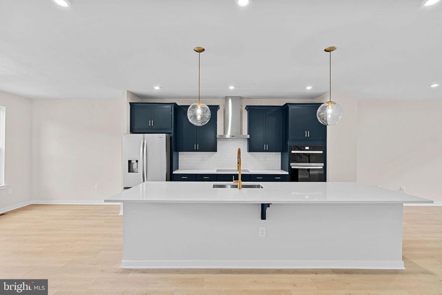 NEW CONSTRUCTION. Special all-in price! Brand-new 2 car garage townhome
available for winter move in. This 3-level interior unit Harding townhome with 4-
bedrooms and 3.5 bathrooms boasts 9 ft. ceilings throughout. The beautiful gourmet kitchen features white shaker style cabinets and black hardware, pendant lighting,
quartz countertops, tile backsplash, a large pantry, range hood, microwave/wall oven
and stainless-steel Whirlpool appliances. Designer laminate flooring is throughout the
foyer, main floor’s kitchen, dining room, great room, and office. The spacious primary
has a generous walk-in closet, and the luxury primary bathroom features raised double
vanities with quartz countertops and a spa shower with seat & designer ceramic tile.
This home’s 2-car garage is complete with an electric vehicle charger compatible outlet.
Enjoy low maintenance living in this community, where snow removal, lawn care, and
more are all seamlessly handled through affordable HOA fees. Get $15K in Closing
Costs* and a free deck until 12/17!** See New Home Counselor for details. Belmont
Park offers true low-maintenance living with luxury townhomes and condos where lawn
care is handled for you. These homes are built for efficiency, reducing common repairs
and upkeep—giving you more time to enjoy life, not maintain it. Plus, enjoy community
amenities such as bocce ball, volleyball, playgrounds, play mounds, and community
greenspace. Belmont Park’s brand-new 2-story homes in Ashburn, VA, are DOE Zero
Energy Ready Homes™ in an ideal location. This community offers everything within
reach— beautiful parks and recreation centers; quick access to major roadways; and
proximity to Dulles Airport. Dining and entertainment abound in Ashburn, from upscale
spots like Cooper’s Hawk Winery to lively venues like TopGolf. MODEL HOME HOURS:
Mon-Sun: 10 AM – 5 PM. Use 19774 Sepia Square Ashburn, VA 20147 for directions in
GPS.