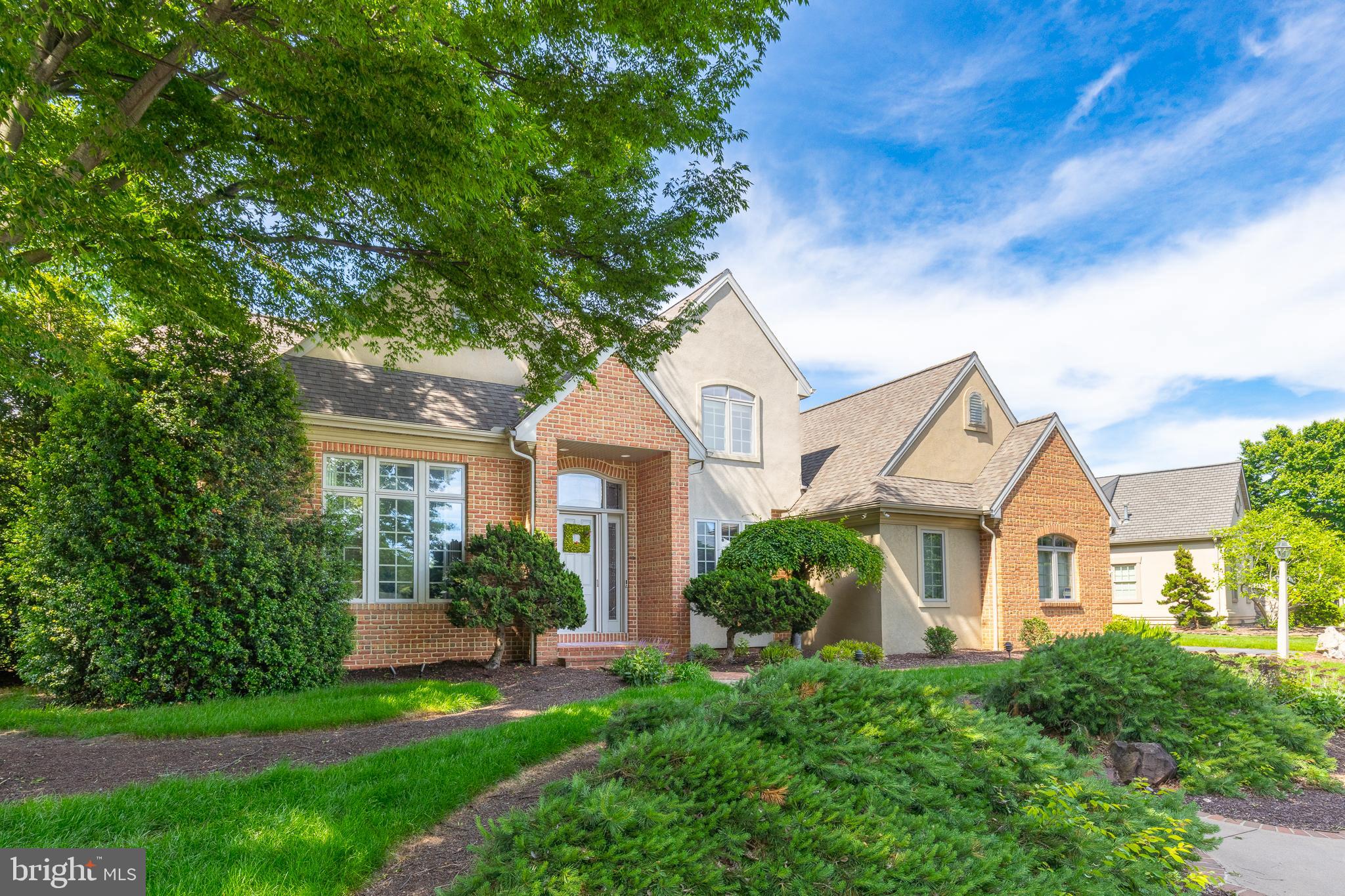 This gorgeous, custom brick home sits on the 16th tee box within the gated Bent Creek Country Club community. This property is in Manheim Township School District and just minutes away from everything Lititz has to offer- shopping, dining, entertainment, and much more! With nearly 5500 sq. ft. of space this home offers endless opportunities. The main floor has over 2000 sq. ft. of common space with high ceilings, large custom windows, multiple fireplaces and views of the golf course. Upstairs you’ll find an enormous owners suite with beautiful cork floors. In the basement you’ll discover incredible bonus space with a den, third fireplace, large bar and full bathroom. Both the main floor and basement include plenty of space to add a 4th / 5th bedroom. The backyard offers a massive private patio and back deck with grill, refrigerator, fire pit, tranquil fish bond and a large flat yard. This home has been meticulously cared for with a newer roof, HVAC and more. Move right in and don’t worry about a thing. Bent Creek offers tons of amenities including golf, tennis, pickleball, dining and swimming. Don’t miss this opportunity. Reach out today to schedule a private showing!