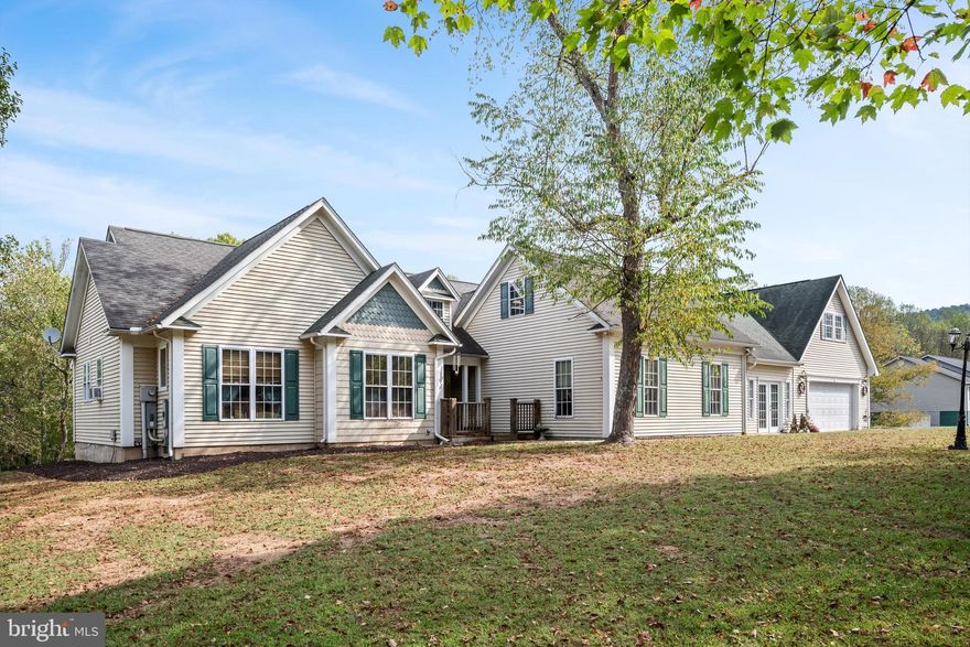 This home is looking for its new owner with water access!!  This beautiful home that was just had the main level freshly painted.  This spacious ranch-style home on 5.86 acres in the desirable Birch Creek subdivision. With over 5,000 square feet of living space, this property is designed for both comfort and versatility.

The main level offers three bedrooms—including a primary suite—along with a cozy living room and a large great room for gatherings.   Off of the  kitchen, stairs lead to a versatile upper-level space above the garage, featuring a possible bedroom, half bath, and rec room—ideal for guests, hobbies, or entertaining. A covered front porch and attached 2-car garage add to the home’s convenience and charm.

Outdoors, this property truly shines. With nearly 6 acres of land, there’s plenty of room to roam, garden, or enjoy peaceful country views. The property also offers access to Back Creek, complete with a private boat dock and pavilion—perfect for fishing, kayaking, or simply relaxing by the water.

Offering the best of country living with modern conveniences, this exceptional property is a rare find—schedule your showing today!