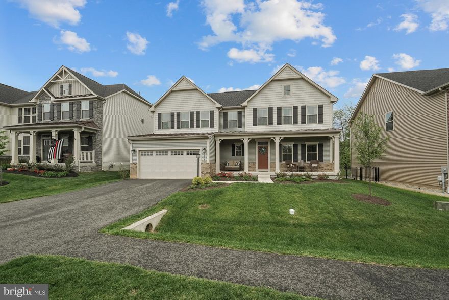 Back on the market!  We decided to temporarily go off the market to allow the current owner’s new home being built to get a little further along to avoid lengthy rent backs.  These Sellers LOVE the home so much, they are having the same builder build, essentially, the same home a little closer to their work!  Welcome Home!! This is BETTER than new without the wait.  With construction costs so high, you can’t replicate this for anywhere near this price!  Recent sales in the neighborhood over $800k make this a steal! This is the one you've been waiting for.  A beautifully upgraded, meticulously maintained, 4 bedroom, 3.5 bathroom home in the HIGHLY sought after neighborhood of Woodridge at Lake Linganore. Less than two years young, this home is better than new. From the moment you walk in, you'll fall in love with the tasteful upgrades. As you effortlessly make your way through the open floor plan, you'll notice all the details.  From the high end decorative lighting, to the large gourmet eat-in kitchen with breathtaking countertops.  The beautiful flooring and stone fireplace perfectly accent the light and airy feel.  This home truly has too many features to list.   As you make your way upstairs, you'll find a generous  primary bedroom with a trayed ceiling, huge/flawless primary bath with a double vanity and tons of cabinetry, and plenty of closet room. Additionally, the upper level boasts three more large bedrooms, another full bath with double vanity, and a well laid out laundry area.  If that weren't enough, you can head to the lower level, a finished walk up basement, with tons of space for a comfortable rec room to hang out and watch your favorite team while the kids play.  When you're ready to take the fun outside, you'll have endless options at your doorstep, literally.  Start by relaxing on the custom built covered screened in deck (one of a few offering this option) The privacy and tranquility of the flat lot backing to the woods will never get old! The home is situated conveniently close to the brand new playground where the kids can spend countless hours playing with friends....of course, that is after a day of soaking up all the fun the Lake has to offer. Sandy beaches, miles of trails, playgrounds, courts, pools, and more.  This neighborhood is truly one of a kind.  You already know the deal - don't blink, this one will fly off the market!