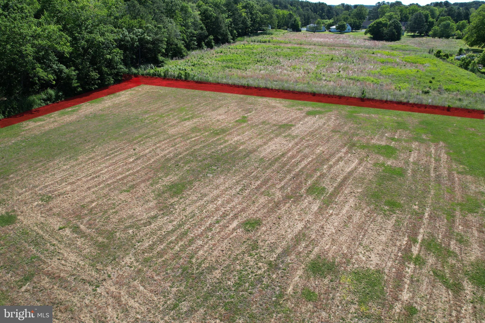 1.74 acre lot located outside city limits with availability of public water and sewer hook-ups. Property is located down a right-of-way off of Cardinal Dr. Build your dream home on this peaceful lot with lots of room to spread out. Located minutes away from several public boat ramps and Somers Cove Marina. Less than an hour to Chincoteague and Salisbury.
