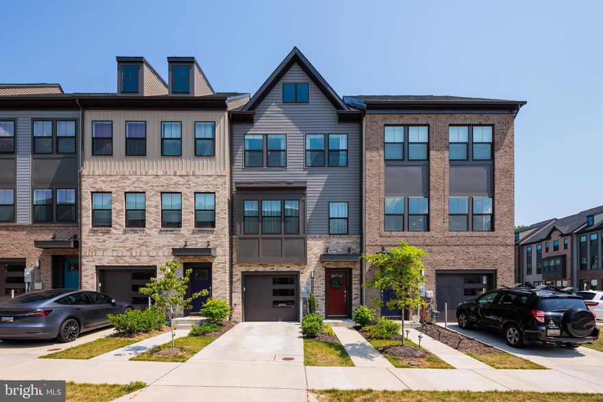 Tanyard Shores is distinguished by its waterfront location and luxury resort style amenities, including a 5,000 sq ft community clubhouse with a coffee bar, lounge, childrens room, patio and outdoor dining, swimming pool with pool house, state of the art fitness center, tot lot, dog park with a dog wash station, outdoor game area, fire pit, hiking trails, wildlife preserve and waterfront beach area with kayak storage and pier.  Convenient to shopping and local dining as well as easy access to key commuter routes and major employers….Fort Meade, NSA Headquarters & National Business Park.

    Modern open floor plan Arcadia, 3 bedrooms, 2 full baths, 2 powder rooms and a 1 car garage.  Rec Room and powder room on entry level.  Open main floor with center kitchen and large granite topped island, stainless appliances including French door refrigerator and 5 burner gas range.  Luxury Vinyl Plank flooring in foyer and on entire kitchen.  Spacious dining and living area on main level with powder room. 
Bedroom level has a generous sized primary suite with walk-in closet and a spa like bathroom,  2 additional bedrooms, a full bath and laundry space in hallway.  
To top this home off enjoy the outdoor space of your 4th level loft and deck offering a beautiful view of the open tree line.  This home checks off all boxes!!!!