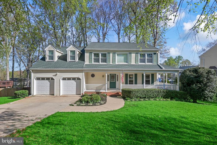 Welcome to this amazing 5-bedroom, 3.5-bath home in the sought-after Vista Woods community with no HOA! The pride of ownership is reflected throughout this warm and inviting home. From the moment you arrive, the charming wraparound front porch invites you in. Inside, you’ll find brand new carpet and fresh paint throughout, along with luxury vinyl tile flooring in the foyer and kitchen. The sun-filled kitchen special features include refaced cabinets, a new refrigerator and dishwasher, dual wall ovens, a central island with cooktop, and a kitchen sink water filter system —all ready for your culinary adventures. Enjoy views of your tree lined backyard and colorful perennials that will be blooming soon while sitting at your kitchen table. The adjoining, spacious family room boasts a vaulted ceiling, brand new luxury vinyl plank flooring, and a cozy wood-burning fireplace insert. This leads out to your two tiered deck with Sunsetter awning—perfect for relaxing in the shade during summer months. The living and dining rooms feature beautiful hardwood floors and offer plenty of space for entertaining family and friends. Upstairs, the primary suite includes a cozy sitting area overlooking the family room, a huge walk-in closet with access to the insulated attic space, a vanity area, and a spacious en suite remodeled bathroom. The other 3 bedrooms on this level are all well-sized with ample closet space. All the bathrooms have had updates which provide modern comfort. Looking for even more room? You will love the huge basement with tons of space for entertainment, new recessed lighting, along with the 5th bedroom and 3rd full bathroom. This has made for a great area for guests and those who would want a little bit more privacy. The basement also has an unfinished area that makes for excellent storage space. Step out through the French doors on the lower level to a patio and fully fenced backyard—a perfect spot to enjoy the mature landscaping, convenient shed, and soon-to-be blooming flowers of spring! Additional highlights include a 50-amp service on the left side of the garage, a solar fan in the attic, sump pump (2024), roof (2017), the transferrable warranty on the 40-year windows (2007), chimney flue replacement (2025), new overhead garage doors and downspouts (2017), 2 year transferable warranty on the patio sliders in family room and french doors in basement (2022), and so much more! The homeowners have loved the close proximity to the neighboring schools, and that it's just a short drive to commuting options, restaurants and shops. Don’t miss the opportunity to make this much loved home yours!