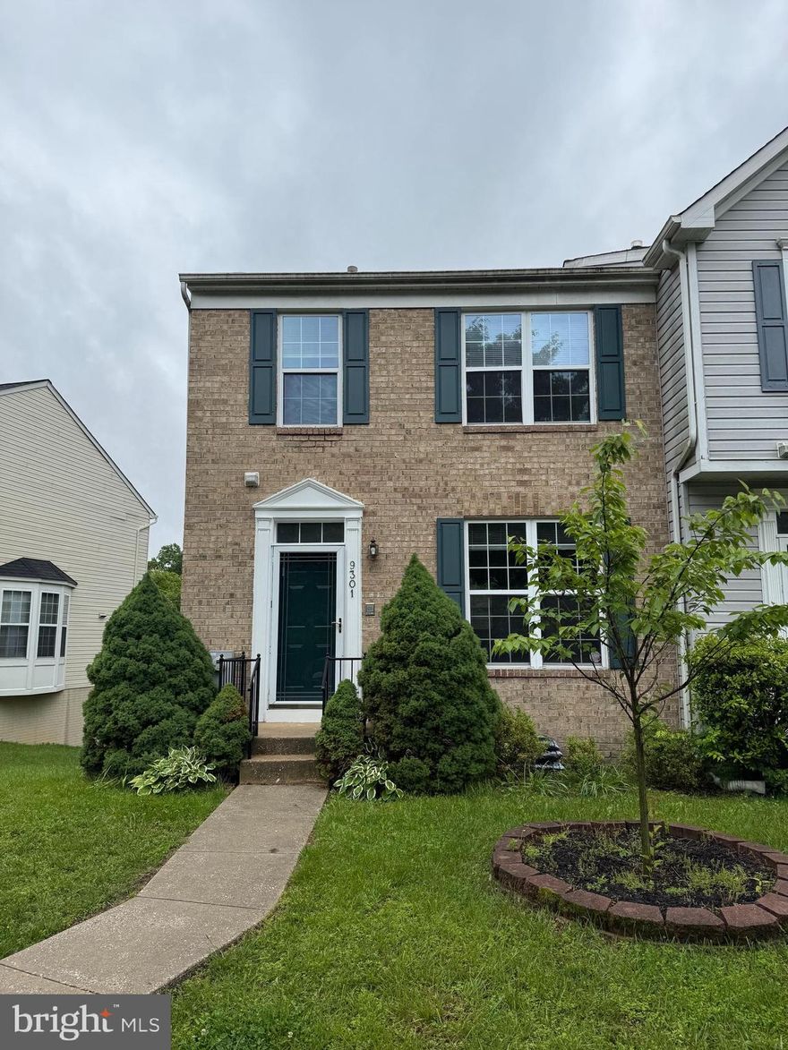 End unit townhouse on a quite street.  Freshly painted throughout and with new hardwood flooring on first level.  First floor offers large living and dining room combo and high ceilings, huge country kitchen with island and breakfast room and bay window.  Large deck with stairs over looking trees.  Fenced back yard.  Primary bedroom with walk-in closet, vaulted ceiling with skylights, two other large bedrooms with vaulted ceilings.  Finished walk-out level basement with full bath and gas fireplace.  Large laundry room with tons of storage.