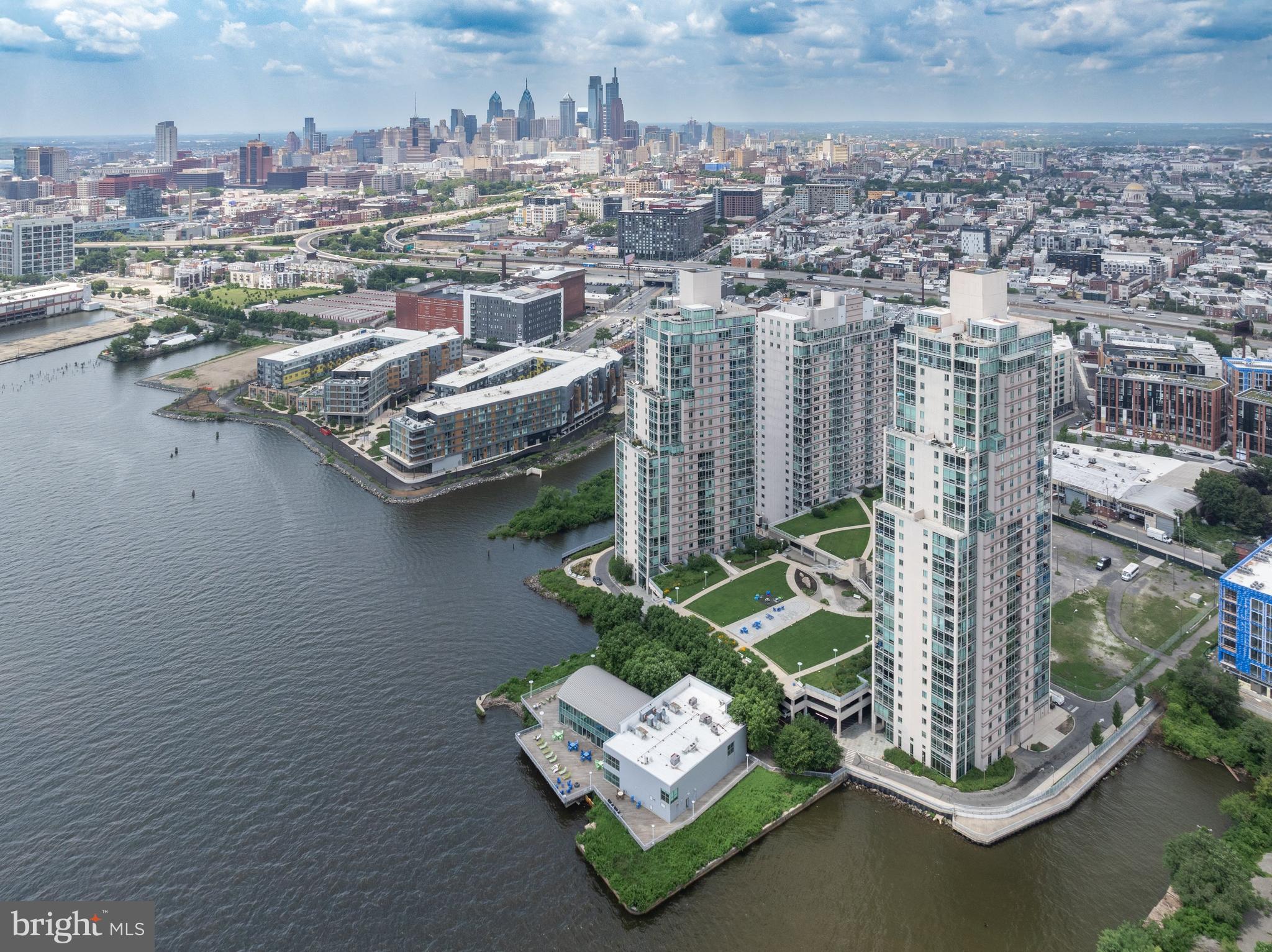 Experience elevated city living in this stunning 2- bedroom,2-5 bath Waterfront condo located in one of Philadelphia's most desirable neighborhoods, Northern Liberties. Floor -to-ceiling windows frame breathtaking, unobstructed views of the city skyline and the iconic Ben Franklin Bridge, creating a dramatic backdrop for everyday life.
The spacious residence features a modern open lay-out, perfect for entertaining or relaxing in style. The kitchen offers ss-appliances, granite counter-tops, and a large additional storage area, with hardwood flooring thru-out. Both bedrooms offer en-suite bathrooms and ample closet space.
Enjoy morning coffee or evening cocktails on your private balcony overlooking the water or take advantage of the premium building amenities such as a fitness center, concierge services and secure parking.
Minutes from Fishtown, Old City and Center City, with easy accessibility to all major highways. This condo delivers the ultimate in urban luxury and waterfront tranquility. Two parking licenses.