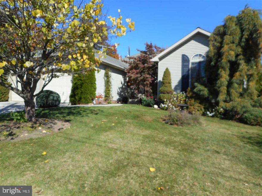BEAUTIFUL RANCHER ON QUIET STREET WITH VAULTED CEILINGS, BEAUTIFUL CHERRY WOOD FLOORS, 2 FULL BATHS AND LIBRARY WITH CUSTOM BUILT WOOD SHELVES. LIBRARY COULD BE CONVERTED TO A THIRD BEDROOM. TWO CAR GARAGE AND A PATIO WITH AWNING.  BASEMENT HAS TWO FULL SIZED WINDOWS MAKING IT NICE FOR POSSIBLE  ADDITIONAL ROOM RENOVATIONS.