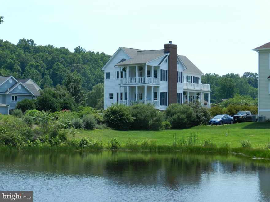 Expansive Views of the Potomac River + Private Pond! On 2010 Historic Garden Week Tour w/ the lush,colorful landscape on this 1 acre waterfront lot. Main Lvl guest suite w/ full bath. Wide plank Pine floors fill the main lvl.  Open Kitchen & Family rm w/ water views from every direction. Master suite w/ balcony, spacious bath. Whole House Generator! Elevator services all 3 lvls.