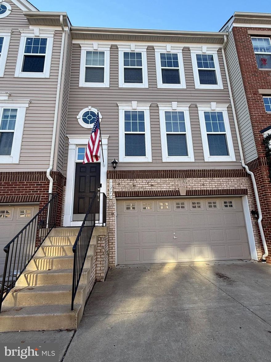 WELCOME HOME! This meticulously maintained property, new to you and nestled in the heart of Bristow, offers effortless access to major commuter routes 234, 66, and 28. Commuting to DC is a breeze with easy access to the VRE. Enjoy shopping and dining options galore in Bristow, Manassas, and Gainesville. 
No need to travel into the office?  We've got you covered with an upstairs office, perfect for those lucky enough to work in their pajamas!
This is the floor plan you've been searching for. The 'Kennedy' model boasts an open main-level layout, highlighted by a stunning 12-foot kitchen island with seating for up to six. White cabinets and granite counters along with recessed lighting and stainless appliances create the gourmet experience you deserve. With ample room for a dining table, you'll love cooking and entertaining in this updated space featuring wood floors and updated lighting.  The main level also provides a comfortable living area with new carpet and freshly painted walls.  Step outside from this main level via your sliding door to the  private rear deck that backs onto trees. It's the perfect spot to relax or entertain! 
Upstairs, discover three  bedrooms—one  of which currently utilized as an office with built-ins that will convey with the home. The primary bath has been updated (lighting, mirrors, fixtures), and the primary bedroom features a vaulted ceiling, and two walk-in closets with closet organizers.
The lower level includes a spacious den area, walk-out to the fenced yard, a full bath, and a two-car garage.  The large double width driveway accommodates  two cars, but  when company arrives, there is plenty of additional parking just steps away at the end of the street.   Come see why this house is the perfect place to call 'Home Sweet Home' today!