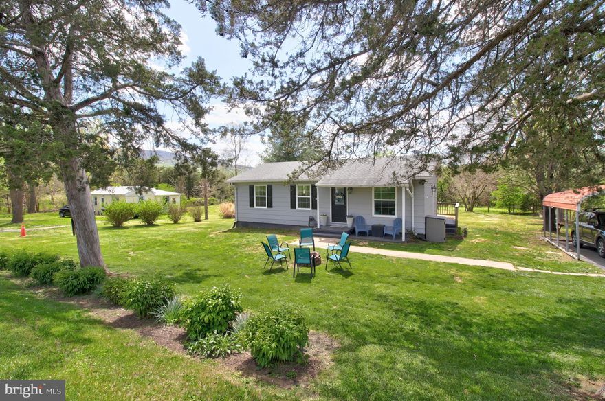 Welcome home to this charming, updated 3-bedroom, 1-bath residence offering comfort, convenience, and beautiful surroundings. The home features fresh paint both inside and outside, a renovated bathroom, new windows and doors, new lighting fixtures and door hardware and a new electrical panel—providing peace of mind while preserving its classic character. Original wood floors add warmth and charm throughout the main level.

The improved full basement offers excellent flexibility with both interior and exterior access, along with washer and dryer hookups—ideal for additional living space, storage, or future customization.  Internet options include ShenTel, HughesNet and Verizon Live Stream.

Set on a generous 0.34-acre lot, the property boasts a lovely yard perfect for relaxing or entertaining. Enjoy your morning coffee on the covered front porch while taking in scenic mountain views. The carport with convenient side entry into the kitchen adds everyday practicality.

Perfectly suited as a starter home, downsizing opportunity, or investment property, this home is move-in ready. Ideally located just minutes from downtown New Market and directly across from the Eagles Club, where you can enjoy breakfast, lunch, dinner, and weekend entertainment including bingo and live music.