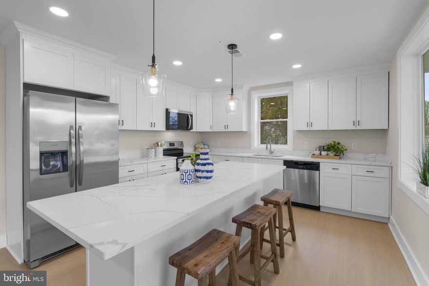 Welcome to a rare waterfront opportunity in Middle River—where peaceful living, beautiful water views, and modern upgrades come together in a newly renovated home that is simply stunning.

Perched on a quiet waterfront side street surrounded by long-time, well-maintained homes, this spacious three-level residence offers beautiful views of the bay and a lifestyle centered around the water. Oversized picture windows fill the home with natural light while capturing sweeping waterfront scenery throughout the day.

The main level features a large kitchen with sweeping water views, a dining room, and a living room designed for gathering and entertaining, along with a main-level bedroom and full bathroom. Upstairs, you’ll find three additional bedrooms—each with water views—and a second full bath. The finished lower level offers a recreation room, laundry area, another full bathroom, and flexible space that could serve as a fifth bedroom, home office, or playroom.

Boating and waterfront living are effortless here with deep water access from your private dock—perfect for kayaking, paddleboarding, crabbing, or heading out by boat to nearby waterfront restaurants like Bowley’s on the Bay.

This home has been extensively renovated down to the studs and fully permitted, offering the feel of a new build with updated electrical, plumbing, HVAC, roof, appliances, flooring, lighting, kitchen, and bathrooms.

An added bonus rarely found in this area: the sale includes TWO tax parcels, creating additional space, privacy, and long-term value. The additional parcel includes a large shed and significantly expands the property footprint.

Set on a large fenced lot with a huge covered patio overlooking the water and a finished basement rarely seen in nearby waterfront homes, this property offers the perfect blend of modern living and relaxed waterfront lifestyle.

Whether you’re looking for a primary residence, weekend getaway, or a home where every day feels like vacation, this is a waterfront opportunity you won’t want to miss.

NEW: 200 amp electrical service, plumbing throughout, HVAC system, roof, appliances, lighting, flooring, carpet, paint, kitchen, bathrooms, finished basement, and some new windows.

Addtional Parcel included  is 10-A Grovethorn Road.