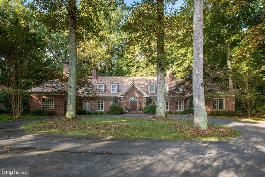 This truly spectacular, all brick, custom built Natelli home is sited on a two acre lot, located in the prestigious community of Avenel. There is a dramatic circular driveway in front of the main entrance that wraps around to a detached, three car garage and breezeway.  An elegant, marble foyer opens to both east and west wings.  The MAIN level includes three fireplaces, a beautiful primary bedroom with two en suite baths, a home office with built ins, large living and dining rooms and wet bar, with  The upper level includes an additional primary bedroom with a fireplace,  two additional bedrooms and full bath. The lower level offers a large recreation room, a wine cellar, two additional rooms and several storage closets totaling approximately 7000 finished  square feet of living space.  Major recent improvements and replacements include a new roof,  HVAC systems, two hot water heaters, ovens, and dishwasher.