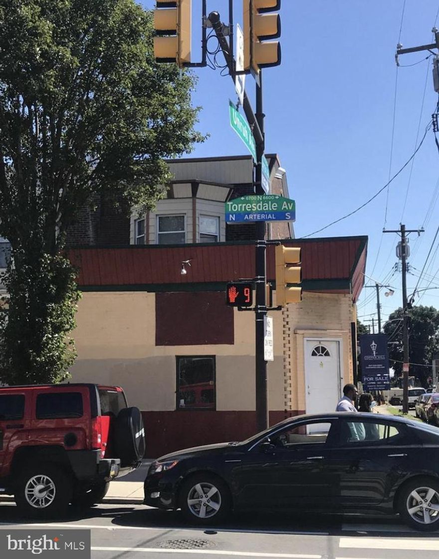 Don't miss this mixed-use investment opportunity on a corner lot with a second floor apartment, located in the up-and-coming commercial corridor of Tacony Disston Community Historic District! 

The storefront features a very spacious commercial area with a blank canvass for the new owner to create their own space. This commercial space was previously used as a printing shop but has the square footage to become desired business or restaurant.

The second floor features a roomy two-bedroom apartment with its own private entrance through the back, as well as attic space for storage. The two units have separate electric meters and share a modern gas boiler; and the building is outfitted with a security system. Don’t miss out on this corner store property located in a busy shopping corridor.