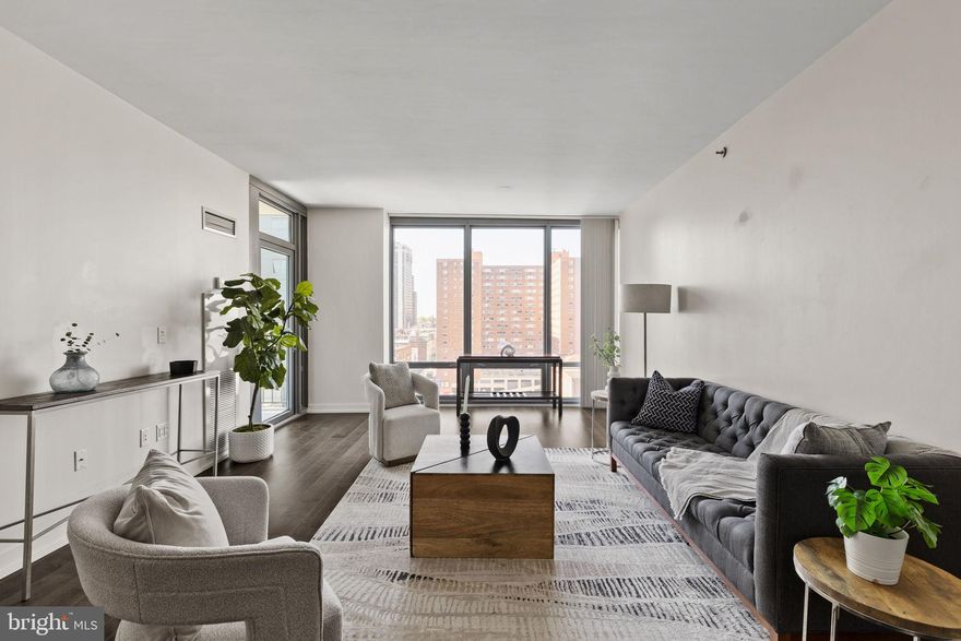 Welcome to Unit 805 at the Murano — a beautifully appointed one-bedroom, one-bath residence offering 822 square feet of sophisticated city living in one of Center City’s most desirable full-service buildings.

This thoughtfully designed floor plan features floor-to-ceiling windows that flood the space with natural light while showcasing vibrant city views. The open-concept living and dining area provides the perfect layout for both everyday living and entertaining.

The modern kitchen is equipped with sleek cabinetry, granite countertops, and stainless steel appliances, seamlessly connecting to the main living space. The spacious primary bedroom offers excellent closet space and easy access to the well-appointed full bathroom.

Additional highlights include hardwood flooring, in-unit laundry, and generous storage throughout.

Residents of the Murano enjoy luxury amenities including 24-hour concierge service, a state-of-the-art fitness center, indoor heated lap pool, sun deck, and resident lounge. Located just steps from Rittenhouse Square, 30th Street Station, top dining, shopping, and major commuting routes, Unit 805 offers convenience, lifestyle, and value in one exceptional package.

An ideal opportunity for an owner-occupant or investor seeking a turnkey residence in a premier Center City building.