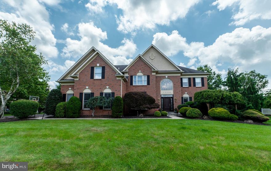 Elegant Brick Colonial, 4 bedrooms, 4 ½ baths, w/4,000+ sq ft of Refined Living space, situated on a Serene 59-acre lot in coveted Wissahickon School District. From the moment you step into the Sun-filled Foyer with Sweeping Grand Staircase, Custom woodwork and Gleaming Hardwood Floors, you’ll appreciate its timeless Sophistication. The Gourmet eat-in Kitchen is a Chef’s Dream, 5-Burner Gas Cooktop, Granite Countertops, Double Wall Ovens, Stainless Steel appliances, Walk-in Pantry, and Central Island which Invites gathering and effortless meal prep. Custom Sliding door opens to the Lush Treelined Professionally Landscaped Backyard featuring a large Trex Deck. The Open Floorplan flows into Stunning two-story Family Room, anchored by Floor to Ceiling Marble Gas Fireplace, Wet bar, Back staircase and Dramatic Wall of Windows. Spacious Living and Dining Rms are perfect for entertaining. Main Floor Study w/Glass French Doors with direct access Full Bath offers a flexible space. Powder Rm and Laundry/Mudroom complete the 1st floor. Upstairs the Luxurious Owners’ Ensuite w/Sitting area, Vaulted Ceiling, Expansive Walk-in Closet is sure to Impress - Fabulously Updated Spa Bathroom boasts - Oversized Seamless Glass shower, Relaxing Soaking Tub and Custom Vanities. Second floor includes – Nicely sized 3 Bedrooms, one of which is an ensuite and along w/hall bathroom. Conveniently located near Springhouse Village, Whole Foods, Starbucks, English Village, SEPTA train station, Rt 309, PA Turnpike and area Nature Trails.