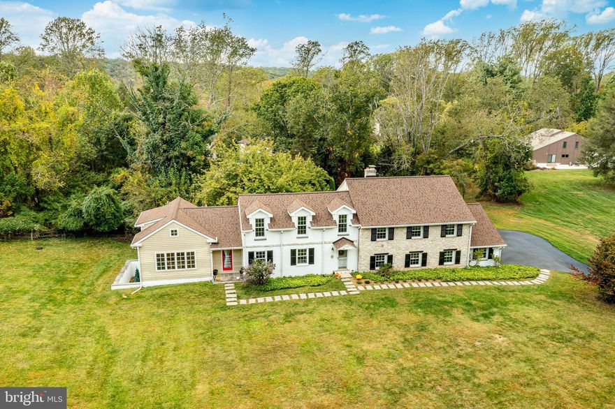 Price Recently Lowered -Newly Renovated Spacious Home - Must Sell IMMEDIATE  due to Relocation - Welcome to this "Well Loved Neighborhood Home Sweet Home" tucked away in a "Private Setting" in the Heart of "Upper Providence Township -Media"  with an "Old World  Flare" -All this located in Award-Winning Rose Tree Media School District - With 5 Bedrooms plus 3 Full Baths and 2 Half Baths there is Room for the Extending Family on a PRIVATE LOT!!!   Everyone gather in the expanded Newer Gourmet Kitchen from the Mud Room, (2nd Front Entrance) Cathedral Ceiling, Stainless Steel Appliances, Gas Cooking, Dacor Oven and Microwave, Large Center Island with Prep Sink, Granite Counters, Tile Backsplash, Under Counter Lights,  Hardwood Floors, Breakfast Area 2 walls of windows -  Butler's Pantry with Granite Counters to the Formal Dining Room for the Larger Holiday Family Gatherings and 2 Sets of Sliders to back deck, NEW Tile Flooring plus a wall of shelving for family collections, Large Living Room with New Tile Flooring - Deep Window Sils add to the charm of this Home from the Foyer, right wing of this home lower level features 1st Family Room with  Brick Wood Fireplace Place - Powder Room , Laundry Room, Access to Rear Yard and oversized 2 Car Garage, 2nd Floor of home features Master Suite with Full Tiled Bath with Stall Shower - 2 Double Closets and Dressing Area - 3 Additional Bedrooms with Full Hall Bath - a few steps up to another Master Suite with Full Bath - Whirlpool Tub - Walk In Closet plus Walk in Storage - Walk up again to AMAZING ATTIC STORAGE -  NEWER Lower Level below the Kitchen features natural light pouring in Large Windows  makes this home perfect for the Extended Family!!!   This Room is perfect for extended family or a Media Room with another powder room, large newer driveway 2022 resealed August 2025 plus shed for the gardener in the family.  Clad, stone, siding, and stucco create the Exterior -Roof (2021), 2 zone central A/C & Heating System, Hot Water Heater in 2017 -If you are looking for a PRIVATE Setting - THIS IS THE ONE!!!!!  Convenient to FUN TIMES in Media - Easy access to Philly from the Media Train Station and the Media Tolley - Access to Blue Route to all Major Arteries to the Jersy and DE Beaches -Minutes to Ridley State Creek and Rose Tree Parks - Shopping is EVERYWHERE!!!! Minutes to Granite Run Town Center - Newly Renovated Riddle Hospital, Rothman & Rocky Run Y - DON'T Miss this one!!!