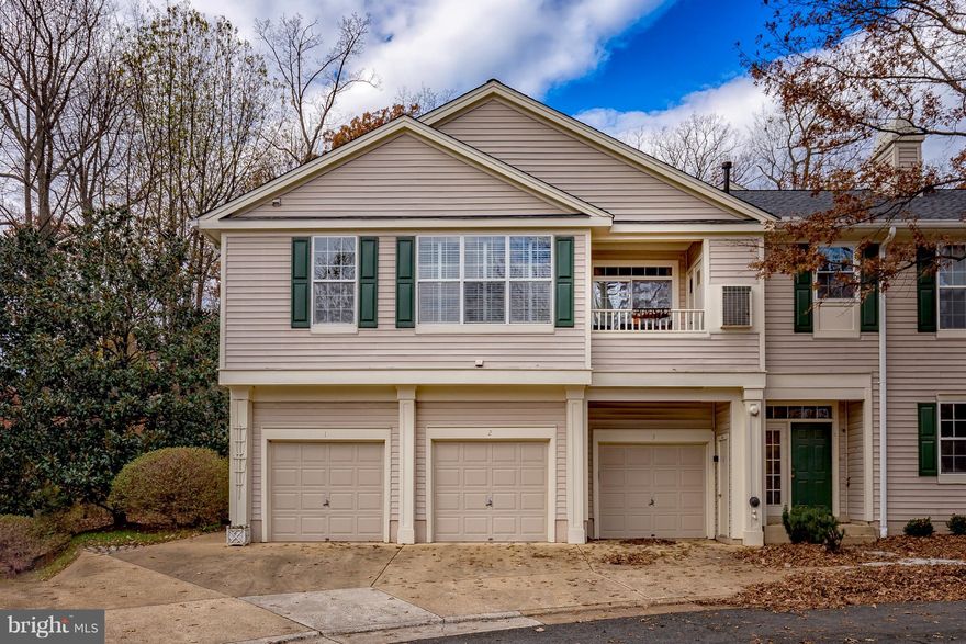 Location, Location, Location!  Welcome to the North Reston area and Sutton Ridge - a quiet condo community featuring a call to nature in an Urban setting!  This lovely 2 Bedroom, 2 Full bath, 1 Car Garage condo is ready for a new owner!  Situated in an ideal location for the every day commuter, this condo community is built in the middle of a wooded section of Reston offering walking paths, picnic pavillions, swimming pools, and other outdoor activities!Spacious design with a vaulted ceiling and open floor plan.  The appliances in the kitchen have been updated as well as a new kitchen floor.  A 3-Sided fireplace adds to the decor and separates the Family and Dining Rooms with plenty of natural light that can be adjusted to your taste with the plantation style blinds.  Enjoy sitting on the covered balcony off the FR and MBR. Close to the Town Center and easy access to Metro - don't miss this opportunity at a great price!