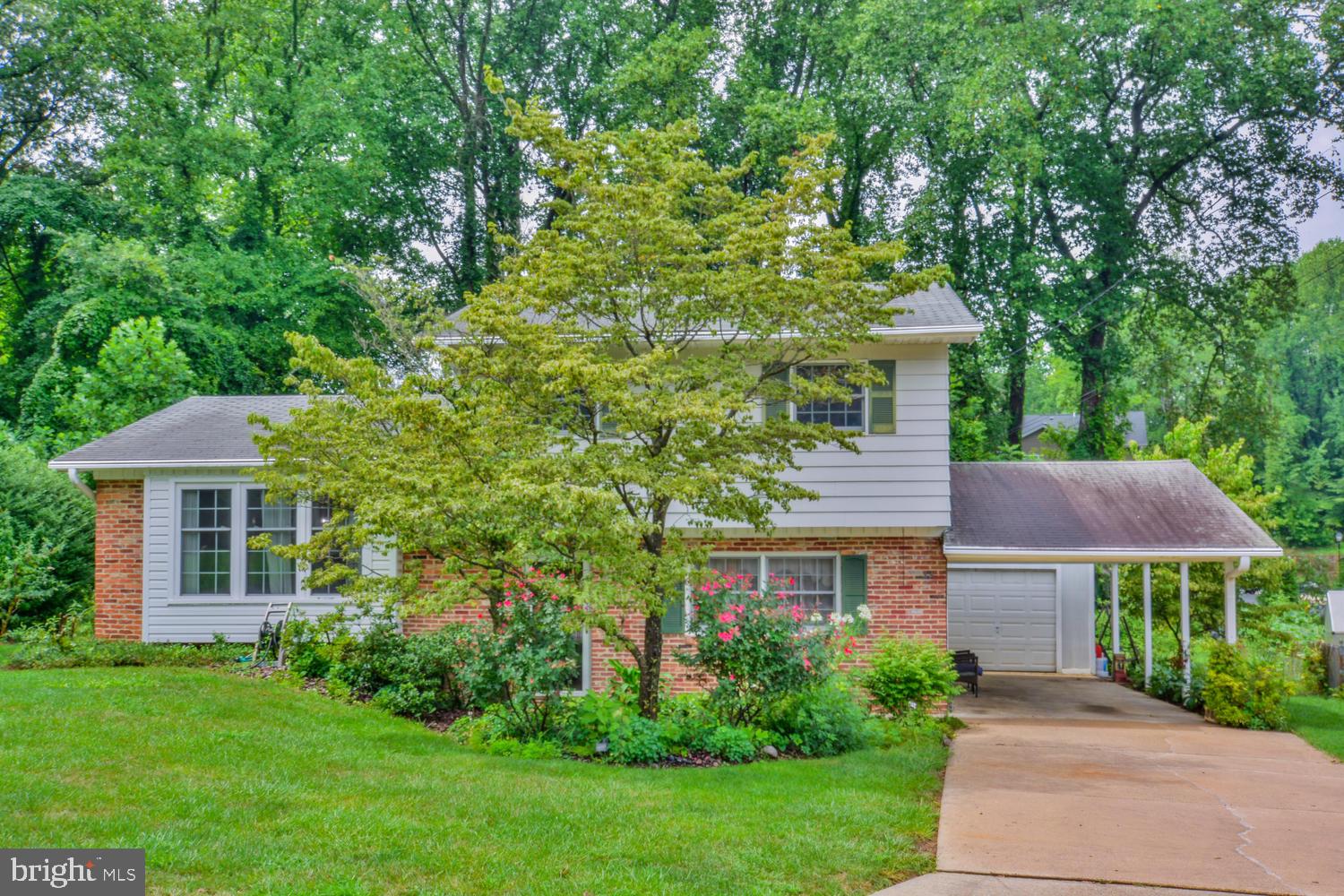 Back on The Market!!! This home has been loved by the Original owners for nearly six decades. They are now ready for new owners to create memories of their own. On the entry level there is a large family room, half bath, 4th Bedroom, laundry area, and large crawl space for storage. The main level includes a second family room or formal living area if you prefer. The dining area is spacious and can easily accommodate a table for 6. The kitchen has a wall oven, cooktop and built in microwave. All of the bedrooms have hardwood floors. The bathroom has been updated with granite counters and tile flooring. The home features a large back porch, patio, 1 car garage, carport and a private backyard that's perfect for entertaining family and friends.