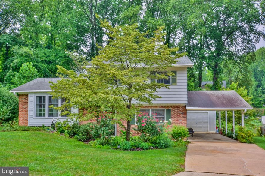 Back on The Market!!!  This home has been loved by the Original owners for nearly six decades.  They are now ready for new owners to create memories of their own.  On the entry level there is a large family room, half bath, 4th Bedroom, laundry area, and large crawl space for storage.  The main level includes a second family room or formal living area if you prefer.  The dining area is spacious and can easily accommodate a table for 6.  The kitchen has a wall oven, cooktop and built in microwave.  All of the bedrooms have hardwood floors. The bathroom has been updated with granite counters and tile flooring.  The home features a large back porch, patio, 1 car garage, carport and a private backyard that's perfect for entertaining family and friends.