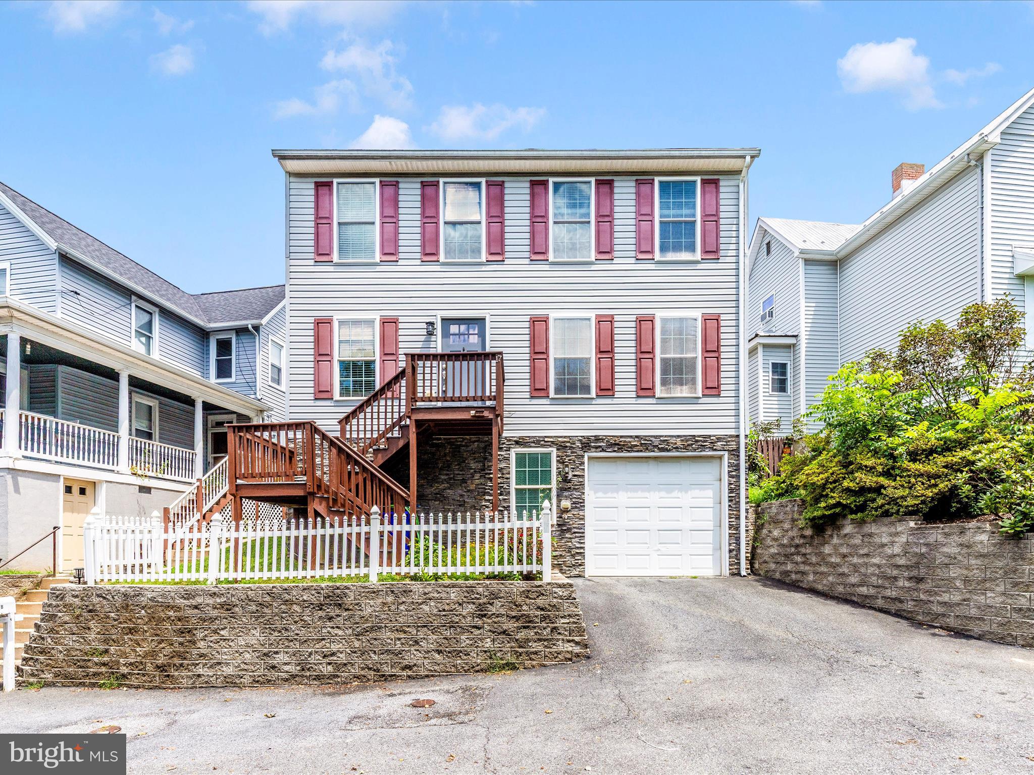 ** Price Improvement ** Welcome home to this beautifully maintained 3-bedroom, 3.5-bath single-family home offering three fully finished levels of comfortable living space with NO HOA. Freshly painted throughout, this home features an updated HVAC system (2021) for year-round peace of mind. The bright and inviting sunroom opens to a level, fenced backyard—perfect for relaxing, entertaining, or enjoying a little gardening. The main level boasts a spacious layout, while the finished lower level offers additional living space ideal for a rec room, guest suite, or home office. A 1-car garage adds convenience and extra storage. Located in a charming community with easy access to major routes, shopping, and the MARC train—this home is ready for you to move right in!