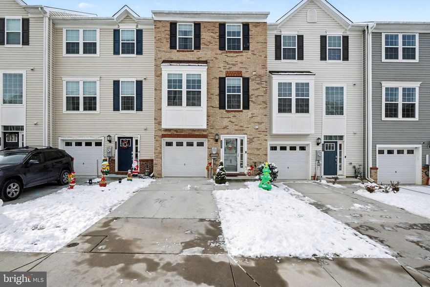 welcome to this immaculate, fully modern 3 bed, 2 full, 2 half bath townhome with a on car garage  in the newer Beech Creek community.  Pull into the driveway or park in the one car garage and enter into the lower level.  There is a convenient powder room directly to the right and the door to the garage to the left followed by a couple closets in the hallway.  The entry way is covered in lvp flooring, but at the end of the hallway it opens up to a large carpeted living room/rec room area.  French doors off of this room open out onto the lower deck.  Taking the stairs to the second floor introduces you to a completely open concept level framed around a gorgeous kitchen.  On one side the kitchen opens up into a large living area with another convenient powder room, on the other side it opens up into a dining area.  Another set of French doors off of this area opens out onto the second level deck which overlooks the fully privacy fenced yard below.  The kitchen itself is a masterpiece with custom lighting hanging above the large granite kitchen island.  There is also a pantry, tons of custom cabinetry, all stainless appliances, granite countertops and a backsplash.  Taking the stairs to the third floor brings you to a full modern bath with tub/shower combo as well as three bedrooms.  One of these bedrooms is the owners suite which has a bump out seating area, high vaulted ceilings, a walk in closet and its own private full modern bath with a walk in shower.  There is also laundry on the upper level for extra convenience!  This house was just built in 2020 so all major systems are relatively new, it is modern, updated and move in ready.  Come see why it should be yours today!