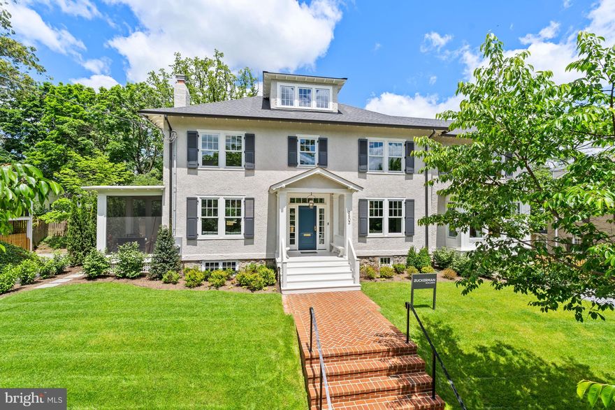 Sited on a quiet, private street in Chevy Chase, 3803 Jenifer St NW presents a colonial home of masterful craftsmanship and incredible scale. Recently remodeled in 2023 by GTM Architects and Zuckerman Builders, the residence features a perfect blend of modern amenities and timeless design notes, such as white oak flooring, wood-burning fireplaces, french doors, recessed lighting, designer selected light fixtures from Visual Comfort, and custom crown molding ceiling detail, throughout a well-appointed traditional floor plan. Boasting 6 Bedrooms and 5.5 Bathrooms across 4 Levels and  7300 square feet, a spacious island kitchen and entertainment salons span the Main Level while enviable private suites and bathrooms are perfectly appointed across the Upper and Lower Levels. The Primary Bath offers a spa-like oasis, including a free standing soaking tub, a spacious, curbless shower with a Graff rain and standard shower head, a private toilet room, and a towel warmer, with radiant floor heat and Calacatta Gold marble throughout. A heated 2-car attached garage, screened in porch and fenced rear yard with lush greenery complete the residence’s offerings. Within prime proximity to dining and shopping destinations, as well as local parks and recreation centers, 3803 Jenifer St NW offers the opportunity for idyllic, residential living in an unmatched locale.