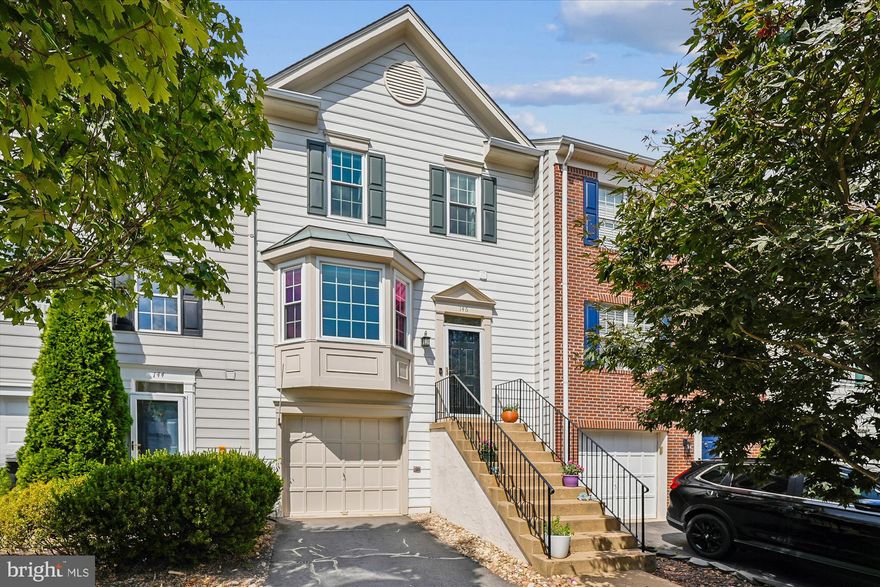Price Improvement! Welcome to this beautifully updated 3-level townhome backing to trees in the sought-after Greenway Farm community. Offering  3 bedrooms, 2 full baths, 2 half baths, and a one car garage, this home combines modern updates with a fantastic location.  
Commuters will appreciate the convenient access to Routes 7, 15 and 267 while being just minutes from  Leesburg's vibrant restaurants, shops, wineries, and breweries.
The spacious main level features a bay window, open living/dining area, and stunning LVP flooring. The gourmet kitchen is equipped with granite countertops, stainless steel appliances (including a French-door refrigerator and newer Bosch dishwasher), and a breakfast area with sliding glass doors to the expansive Trex deck overlooking the fenced yard and common space.  
The lower level offers a cozy rec room with a gas fireplace and walkout access to the backyard, along with additional LVP flooring, a laundry room with new LG washer and dryer, and a recently added half bath. Upstairs, the primary suite features a vaulted ceiling, double walk-in closets and ceiling fan. Two additional bedrooms, a full bath, and pull-down stairs access to the attic complete the upper level.
Current owner updates include: new LG washer/dryer & Bosch dishwasher (2024), new windows/screens (with transferable warranty) & sliding glass doors (2023), LVP flooring on main & lower levels, stairs, and upper level hallway (2023) and a new lower level half bath (2023). Previous listing indicated prior owner replaced roof in 7/2021, Trex deck and French door refrigerator in 2020. 
Enjoy all Greenway Farm has to offer, including a large community pool, basketball & volleyball courts, playgrounds, walking/jogging paths and plenty of parking. Don't miss this opportunity!