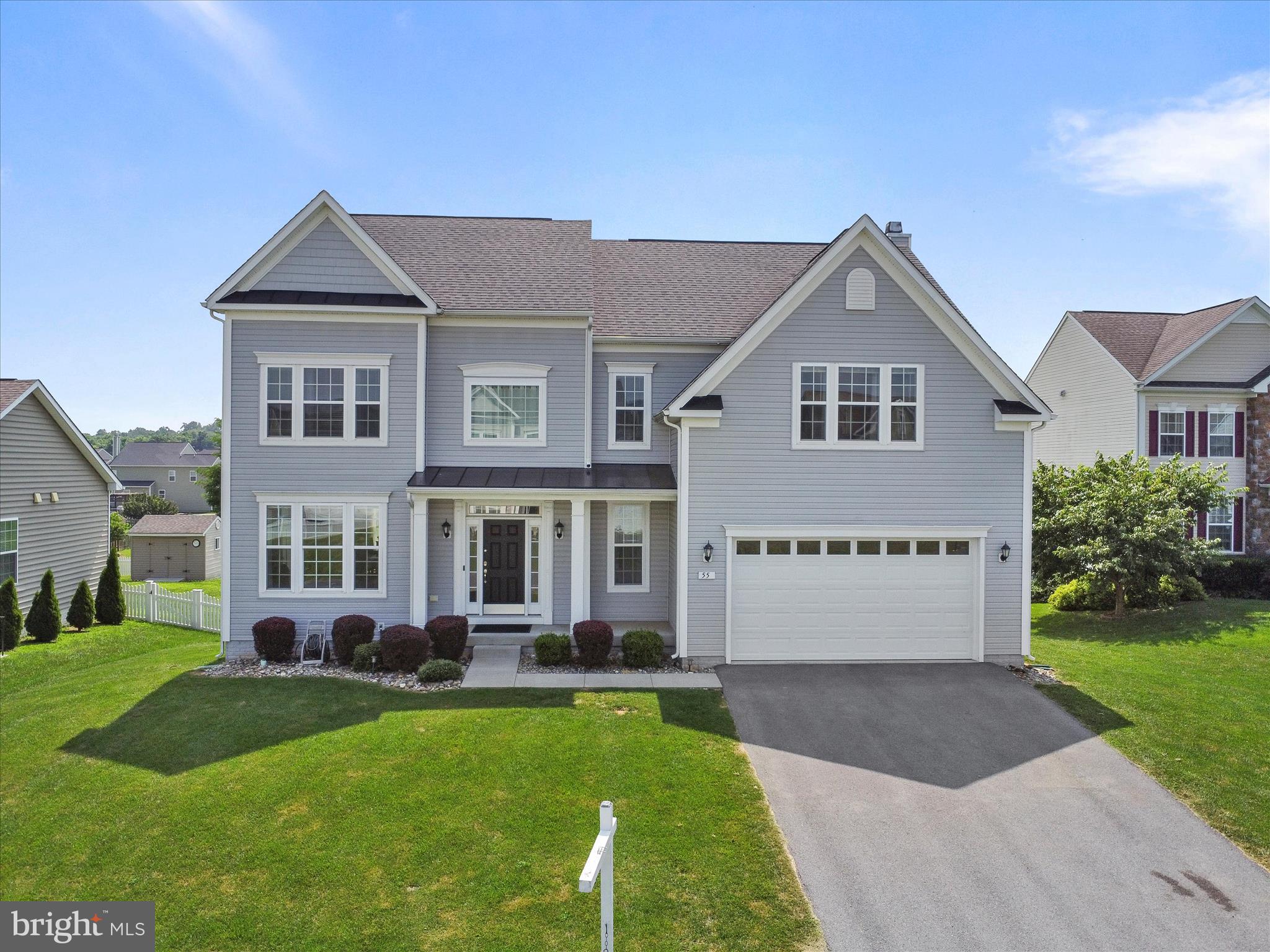 Stunning 5 bedroom home with a finished basement, huge Trex deck and a nice flat yard with amazing sunrise views. The front porch will welcome you with anticipation of holiday decorations. As you step inside the home, the foyer will greet you with hardwood floors and tons of natural light. The open kitchen with island creates a wonderful entertaining space with it's open concept. With plenty of cabinets and a nice large island, the chef in your family will not be disappointed. Head out back on the 12 x 30' Trex deck to sit and relax, barbeque with friends or to watch the local wildlife. The family room has plenty of room for gathering and with the wood burning fireplace, you are sure to enjoy the cozy feeling on cold winter nights. The upper-level houses 4 bedrooms. The large primary bedroom will wow you with all of its space. It includes a sitting area bump out for a reading nook, office space or an extra dressing area. The primary closet has been upgraded with built in closet organizers to create extra space and to add some style. The primary bathroom is large and spacious with double doors. You'll find a stall shower, deep soak tub and double sinks. The 3 additional bedrooms on the upper level are a good size with carpet and great light. The lower level is completely finished. Use the large open area for entertaining, a gym, family space or use the entire lower level as a separate living quarters. The lower level has a very large bedroom with full egress window and a large closet with a closet organizer. To complete the space, there is a full bathroom with stall shower on this level. Wait until you see this rare lot. The .31 acres is flat and open to a huge HOA common area. You will love the privacy and the views. This house is missing nothing but a new owner. Come and see how you can make this house...your home.