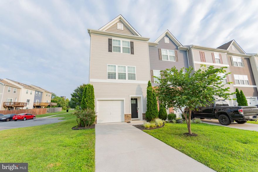 Welcome to Berkeley Ridge, where comfort, style, and convenience come together in this stunning end-unit townhome built in 2018! With 1,882 sq ft, 3 bedrooms, and 2.5 baths, this home is move-in ready and packed with upgrades you'll love.  Step into the main level, where you’ll find a spacious living room with a ceiling fan and beautiful luxury vinyl plank flooring that flows through to the bright kitchen. Featuring granite countertops, a separate island, pantry, recessed lighting, and stainless-steel appliances, the kitchen also includes a breakfast nook.  Upstairs, you'll find three generous bedrooms, a full bath, and a convenient laundry room. The primary suite is a true retreat with a walk-in closet, ceiling fan, and an en-suite bath offering double sinks and a separate shower.  The lower level adds even more flexibility with a spacious recreation room, a half bath, and sliding glass doors that open to the backyard.  Additional perks include 1-car garage, vinyl siding, concrete driveway, and close proximity to the community playground and overflow parking!  BONUS: Seller is including an American Home Shield Home Warranty.   Live minutes from restaurants, shopping, schools, and with easy access to I-81, I-70, I-270, and I-68—plus a quick commute to Maryland and Virginia.  Schedule your private tour today and see why this Berkeley Ridge beauty won’t last long!