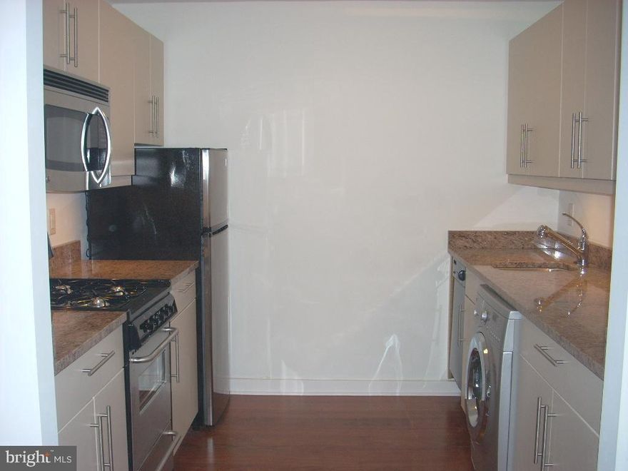 Spacious studio at the highly coveted Parc Rittenhouse on Rittenhouse Square! The home features a kitchen with stainless steel appliances, granite countertops, modern cabinetry, and a washer/dryer. The open living space enjoys beautiful natural light and high ceilings. The marble bathroom features a shower/tub combination and single vanity. Additional highlights include Brazilian cherry hardwood floors and baseboard moldings.  Residents of Parc Rittenhouse enjoy world class amenities and services including a 24 hour doorman; an amenities suite that includes a brand new state-of-the-art fitness center and resident lounge with pantry; media room; outdoor rooftop pool club with a large pool deck, full size pool, kids pool and hot tub; garage parking below the building for an additional fee; and two amazing restaurants on the ground floor, Stephen Starr’s Parc and Via Locusta.