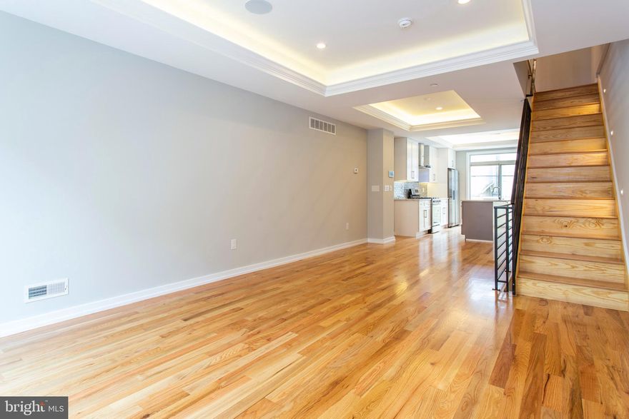 A gorgeous home in Newbold that you simply need to see! This beauty includes fabulous details throughout, including hardwood flooring, high ceilings with hard-wired speakers, recessed lighting and large windows for ample natural light. The open living and dining room floor plan is just the spot for entertaining, and naturally lead to a kitchen that s sure to please, with stainless steel appliances, elegant cabinetry and a tiled backsplash. This delightful home also features spacious bedrooms with ample closet space, a large master suite that is sure to please, not to mention a large roofdeck- just the spot to enjoy the company of your favorite guests on those warm weather afternoons!Found within easy walking distance to restaurants, shopping, schools, public transportation and much more, you'll have the best of Philly at your fingertips. Don't wait, see this home today!