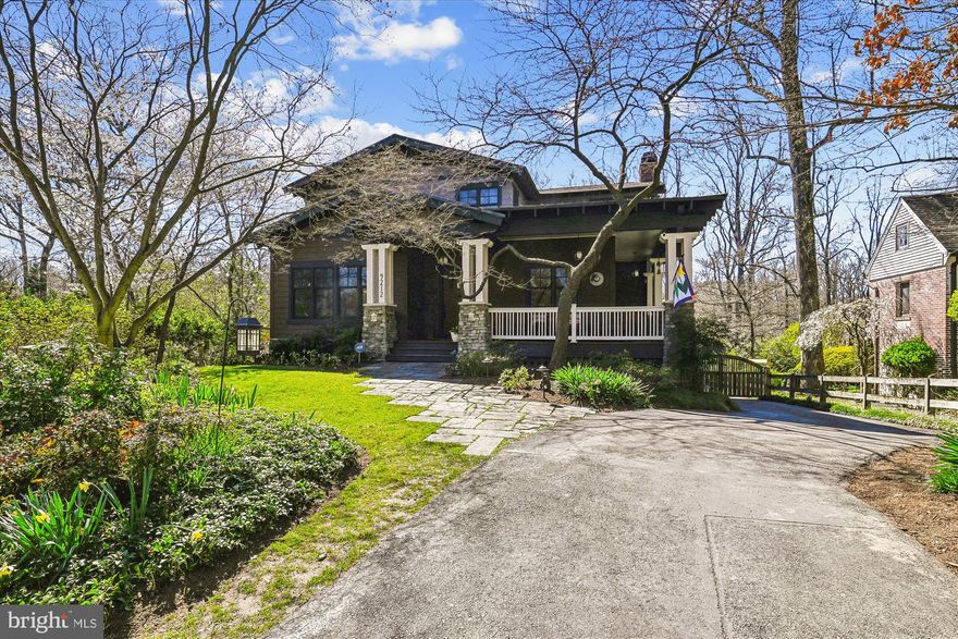 Welcome to this stunning custom residence nestled on a cul-de-sac, in a beautiful tree lined neighborhood in Silver Spring. This beautiful yet unassuming Craftsman style home was the 2001 Best in Living Home of the year. Meticulously maintained by the current owner & architect for over 23 years. 
Simple but elegantly detailed this residence exudes charm and and true character from the moment you step onto its welcoming front wrap around porch. As beautiful as the home is on the exterior, it meets its match inside. With 4 bedrooms 3.5 Baths, an oversized 2 car side load garage, across 3 finished levels.   
The oversized entry door invites you to the generous foyer and main level.  Starting in the foyer, a pattern of beams and columns in Oak give rhythm to the first-floor spaces.  A beautiful handcrafted storage bench graces the entry hall.  
Formal living and front library define the front side of the main level, perfect for cozy evenings or entertaining guests.
The adjacent  elegant formal dining room sets the stage for memorable gatherings, Then together, the expansive Chef's kitchen opens to the family room and serves as the heart of the home for everyday living. 
The Chef's kitchen features stone countertops, Cherry stock cabinetry in the Art and Crafts style, a six burner gas cook top & S.S appliances. A wonderful baking countertop is a marble countertop, while the back wall is finished in white subway tiles. Small windows on either side of the gas stove top provide natural light and give visual interest and definition to the room. An inviting island with seating plus a generously sized breakfast area enhance the space. 
The separate laundry area off of the kitchen also provides additional counter space and storage with  access to the rear and side garden.  
The cozy family room with its warm tones features custom cabinetry, a wood burning fireplace,  and coffered ceilings, the perfect combination of elegance & functionality. Tile work incorporated in the fireplace echoes another typical Arts and Crafts motif;  Next to the family room, access the  wood deck overlooking the rear garden. A perfect  spot to enjoy your morning beverage. 
The primary main level bedroom suite is the perfect place to unwind and relax. With a gas fireplace and radiant heat floors. The large spa like bath also features radiant heat floors, a soaking tub, a glass door-less walk-in shower and separate his and hers furniture like vanities with green Avonite countertops. 
The second level. encompasses three spacious bedrooms, a wide hallway can act as a study area. The hall full bath has a separate tub and water closet, as well as two vanities with storage cabinets and linen closet. 
A finished lower level  adds even more space for recreation and is ideal for family gatherings,  A separate  open room can be used as a  fitness area, office or 5th bedroom.  A full bath, and extra storage rooms complete the lower level. Access to the oversized garage and additional storage area are on this level.  
This home brings community and all the benefits of downtown Silver Spring.  Entertainment, library, transit retail and grocery stores.  A block away from Sligo Creek Park where you will find walking paths, Playgrounds, and tennis courts.  Be warm, be welcome be at home!