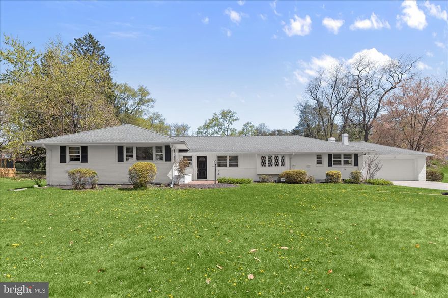 Welcome to 1910 Lyden Road, a well-situated split-level home nestled on a spacious and private 0.79-acre lot in the desirable Valley Crest area of Lutherville-Timonium. Surrounded by mature trees and offering a peaceful, tucked-away setting, this property blends everyday comfort with exceptional outdoor space in a highly convenient location.

The main level features a bright and expansive living room with direct access to the rear patio, creating a seamless connection between indoor and outdoor living. The living room flows effortlessly into the dining area, ideal for both casual meals and entertaining. A separate family room provides additional gathering space, complete with a gas fireplace and its own access to the back patio, enhancing the home’s functional layout.

The kitchen is generously sized and thoughtfully designed, featuring granite countertops, ample workspace, a breakfast nook, and views overlooking the front lawn. Outfitted with brand-new stainless steel appliances, the kitchen includes an induction cooktop, wall convection oven, built-in microwave, refrigerator, and dishwasher, offering both modern convenience and efficiency.

The home offers a well-balanced bedroom layout, highlighted by a primary suite with an attached bath and a cedar walk-in closet. Two additional bedrooms provide flexibility for family, guests, or a home office. A mudroom is conveniently located just off the kitchen, along with a powder room and access to the front-loading two-car garage.

Additional features include white oak flooring throughout and fresh interior paint, contributing to a clean, updated feel. With over 2,500 square feet of living space and a thoughtfully designed layout, this home presents a rare opportunity to enjoy space, privacy, and comfort in one of Baltimore County’s most sought-after areas.