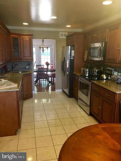 9003 ROLLINGWOOD DRIVE