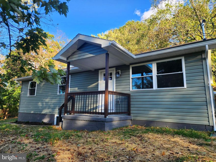 Total Makeover! Beautifully Renovated & Move-In Ready Welcome to this fully remodeled 3-bedroom, 2-bath home offering 2,000 square feet of stylish and comfortable living space. Every detail has been updated—from the new roof, flooring, and kitchen, 2 updated baths, HVAC and central A/C, siding, electric service, water heater, windows, and door—giving you modern comfort and peace of mind. Enjoy the upgraded kitchen featuring sleek stainless steel appliances and elegant granite countertops.  Additional features include: All kitchen appliances convey, ample parking, additional lot included. A 3rd lot at an additional cost with stunning view of the city.  A full basement partial finished with full bath and balance ready for your plans. Whether you're hosting guests or enjoying quiet evenings at home, this property is move-in ready and waiting for you. Don’t miss out—schedule your private tour today!