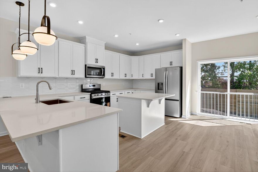 Ready For Immediate Move-In!! The Potomac model offers spacious and flexible living across three stories, with an optional fourth-story loft and deck for even more room to grow and entertain. This thoughtfully designed townhome features 3 to 4 bedrooms, including a bright and open primary suite on the bedroom level, complete with a conveniently located laundry area. Two generously sized secondary bedrooms provide space for family and guests with a full-size bathroom. On the main living level, you'll find an impressive open-concept kitchen that seamlessly connects the great room and dining area—ideal for everyday living and effortless entertaining. The attached 1-car garage opens to a recreation room or 4th bedroom with full bathroom. As a homeowner, enjoy community amenities, including the dog park, community playground, pickleball and tennis court, and community gardens. Plus, enjoy access to Sparrows Point Country Club, which includes a marina, boat ramp, newly renovated clubhouse with restaurant & bar, an 18-hole championship-style course on Bear Creek, and the 2nd largest pool in Baltimore County. See your brand-new home today. Enjoy energy savings with our ENERGY STAR® certified and Indoor airPLUS-qualified homes. *Photos are of the Model home. *This listing reflects the base price for a to-be-built home on a lot in the community. *Pricing, features, and availability subject to change without notice.