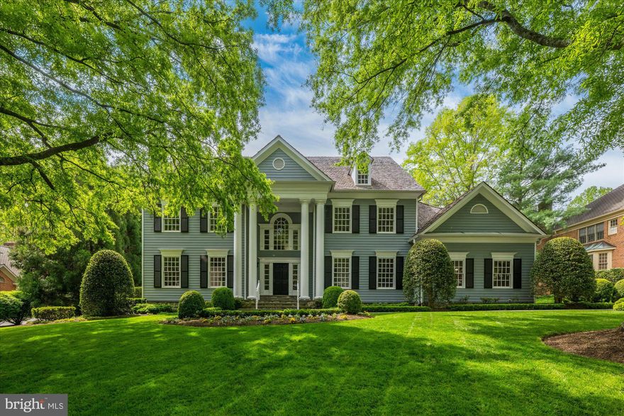 Tucked away on a quiet cul-de-sac in sought-after Woodlea Mill, 8405 Brookewood Court offers an exceptional combination of scale, layout, and resort-style outdoor living across approximately 7,000 square feet. The main level is thoughtfully designed for both everyday living and elegant entertaining, featuring a dramatic two-story foyer and a stunning two-story family room with soaring 19’+ ceilings and a gas fireplace. Formal living and dining rooms provide classic gathering spaces, while a private study offers ideal work-from-home functionality. The spacious kitchen opens to a light-filled breakfast room and is complemented by a walk-in pantry and adjacent mudroom, with direct access to the three-car garage. Multiple access points lead to the outdoor living areas, seamlessly blending indoor and outdoor spaces. Upstairs, the expansive primary suite serves as a true retreat, complete with a tray ceiling, dual walk-in closets, and a large en-suite bath with a soaking tub and separate shower. Three additional generously sized en suites include ample closet space and access to well-appointed bathrooms, all overlooking the open foyer below. The walk-out lower level is designed for recreation and relaxation, featuring a large recreation room with fireplace, a game room, media area, and a full wet bar. A fifth bedroom and full bath provide excellent guest or au pair accommodations, while additional unfinished space offers great storage space.  Outdoor amenities elevate the property to a private retreat, highlighted by a swimming pool, multiple patios, terraces, and a deck—ideal for entertaining or relaxing. With its expansive layout, versatile living spaces, and exceptional private backyard and outdoor amenities, this home delivers the perfect blend of comfort, functionality, and lifestyle in a prime McLean location just minutes to Tysons, the Toll Road and 495.