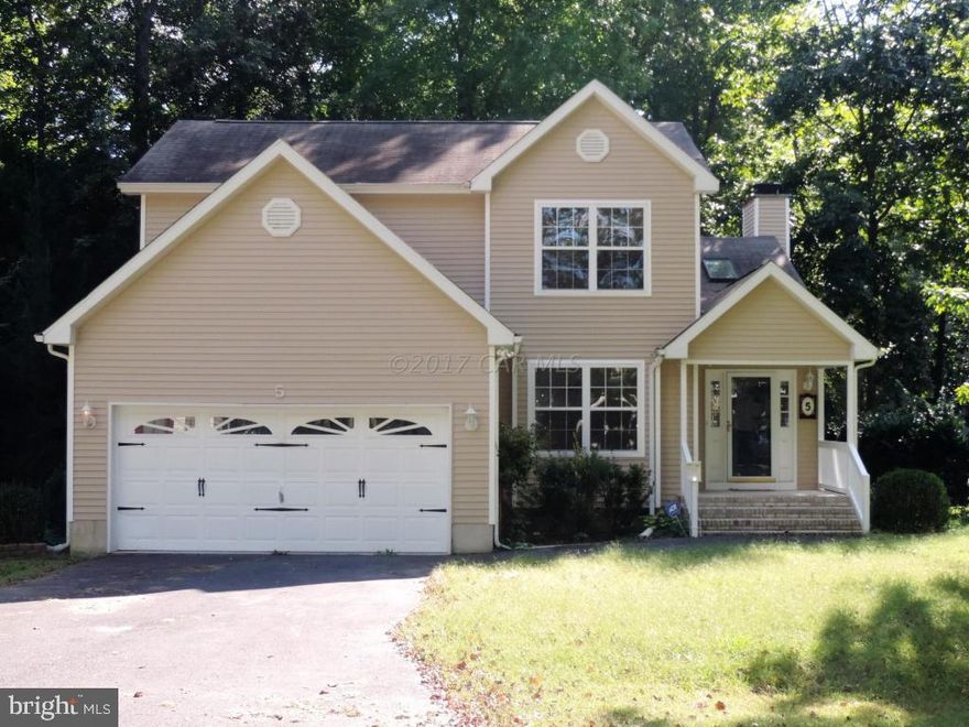 Beautiful 4 Bedroom Home. UPDATED CARPET AND INSIDE HOME PAINTING JUNE 2017. First Floor Master Suite.  Screened Back Porch. 2 Car Garage.