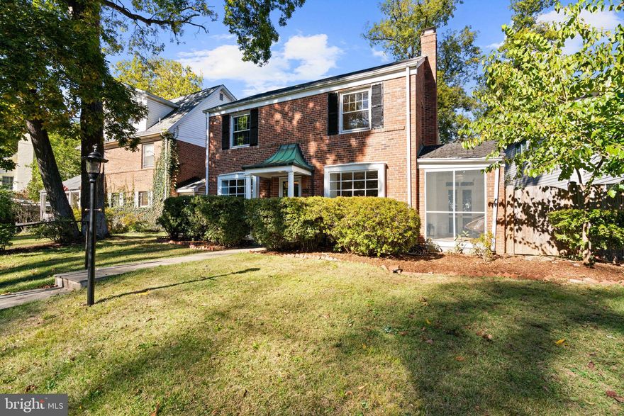 Every now and then, a house comes along where the layout simply works and the location makes every day feel easy. This classic brick Colonial in Greenwich Forest features four bedrooms up, dramatic family room addition, and a fully fenced backyard framed by mature azaleas and hydrangeas.

A flagstone walkway and manicured front lawn is adorned with a gas lantern and a covered front entry that sets a timeless tone. Inside, a center-hall entrance opens to the formal dining room and a spacious living room anchored by a cozy fireplace, complete with built-ins for display and storage, and access to a charming side screened porch.

The large eat-in kitchen offers ample cabinet storage, granite countertops, stainless steel appliances, and a sun-drenched breakfast area with direct access to the back deck -- perfect for easy everyday living and effortless entertaining. (The owners have comfortably hosted gatherings of more than one hundred guests here!) The kitchen also includes built-ins for additional storage and display, while the adjacent family room features 10+ foot ceilings and walls of oversized windows that fill the space with natural light.

Upstairs are four real bedrooms making this an ideal Bethesda floorplan. The primary suite is light-filled with loads of windows, a large walk-in closet, along with a newly-renovated primary bath featuring double vanity with marble countertop, soaking tub, separate shower, and a spa-like vibe. Three other bedrooms with hardwood floors, roomy closets, and new light fixtures, along with a remodeled hall bath with marble vanity and white subway tile evoke a classic aesthetic.

Need even more space? A floored attic, accessed by dedicated staircase, provides excellent storage or future finishing potential. And in the freshly finished lower level you'll find laundry, a finished rec room, quarter-bath, storage room, and a private entrance.

With its gracious layout for entertaining, prime Greenwich Forest setting, and proximity to downtown Bethesda, Metro, shops, and restaurants, 5621 Huntington Parkway delivers both charm and convenience in one of Bethesda’s most beloved neighborhoods. Bradly Hills, Pyle, Whitman schools serves the neighborhood. SQFT estimated by third party and should not be used for valuation. Reliable but not guaranteed.