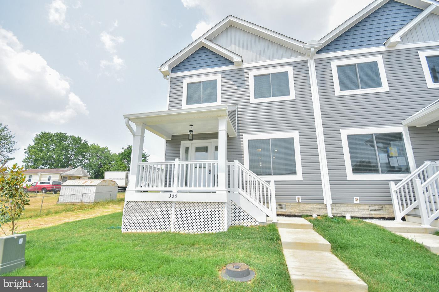 Beautiful brand new duplex with almost 1900 square feet of living space is waiting for a family. This home features 3 bedrooms and 2.5 baths. Open concept living room, kitchen and dining area. The kitchen offers stainless steel appliances, pantry, island and granite countertops. The separate family room allows more room to relax. A laundry area is conveniently located on the upper floor which includes a washer and dryer. Walk out to your 10 by 8 deck or sit out on your covered front porch and enjoy the morning sun. This home has luxury vinyl flooring throughout. Located half a block from the new Fairfax Blvd. that goes from Ranson Circle to the Home Depot with walking paths. Make your appointment today.