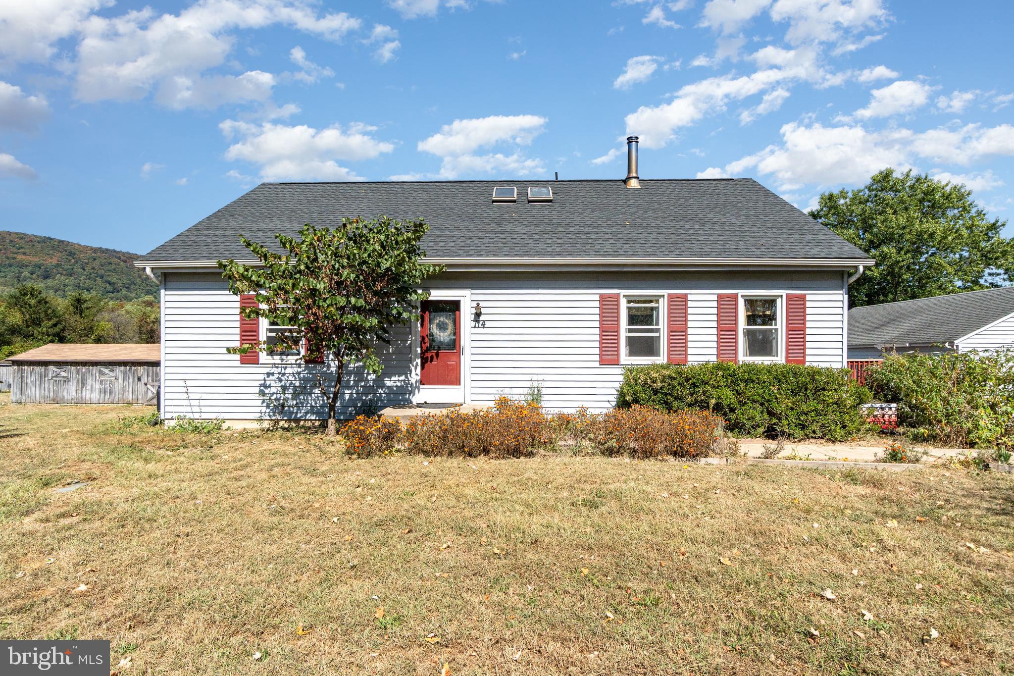 Perfect property for anyone looking for quiet country living with mountain views and space. This 4.75 acre farmette will appeal to hobby farmers, horse enthusiasts, homesteaders, families or retirees. Spacious 3 bedroom, 2 bath Cape Cod offers one-level living on the first floor with a primary master suite that has an attached office that was once a fourth bedroom and a convenient full bathroom. The country style kitchen flows into the living room which has a cozy woodstove that heats entire home. The central dining room opens up to back deck and offers scenic views of the North mountain. Upstairs you will find two large bedrooms on either end of the home with lots of attic space. A full bathroom, hall closets and a sitting room/office nook complete the upstairs. The large, partially finished, walkout basement currently has an office, large bedroom, and family room on finished side. Unfinished side has custom shelving and pantry for extra storage space as well as laundry area. Outside you will be sure to enjoy and want to entertain with a large yard with underground dog fencing, wrap around deck and above ground pool. There is a three stall barn with tack room, fenced in area with paddocks, 3 rotating pastures for your horses and farm animals. Additionally there is a detached, oversized two-car garage that provides even more convenience and storage. This charming country home is awaiting its new owners and the opportunity for them to add the extra special touches to make it their own.