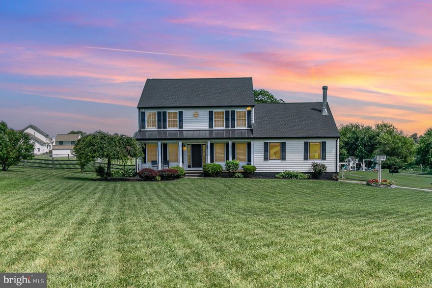 This picturesque Colonial and 4.3 acre farmette promises an elevated living experience for humans and animal friends alike! The tastefully renovated home with 4 beds and 2.5 baths boasts an open and inviting floor plan with high quality modern finishes throughout, striking vaulted great room addition built in 2023 with wood fireplace, separate Mitsubishi heat pump and transom-topped French doors to the backyard, a handsome formal living room and open dining room with French doors to the covered deck, and a huge gourmet kitchen renovated in 2023 with picture window and pasture views, 42" cabinets, sleek quartz counters, prep island with bar seating, plus superior grade SS appliances including  oversized refrigerator, double-oven range with convection cooking and wine fridge for your favorite beverages. Upstairs, the generous primary suite with his-and-hers closets and a primary bath with oversized walk-in shower and jetted tub will wrap you in comfort. The first floor laundry room with workspace and sink provides additional convenience, while the ready-to-finish basement with walk-up exit is ready for growth or storage. You'll enjoy peace of mind and substantial documented cost savings with a new roof, siding and 14.4kw owned solar panels installed in 2022, plus tankless hot water heater and new kitchen windows added in 2021.  The well-constructed 60x64 barn built in 2017, with oversized doors and  a large main floor area to easily accommodate vehicles or equipment, two big stalls, tack room, storage room, hay loft and heated workshop, is surrounded by 3 fenced pastures including one with a separate 2-bay run in shed, and an enormous, fully fenced backyard with play area and zip-line. The cul-de-sac location and extended driveway with huge parking pad create a welcome sense of space and privacy, yet is pleasingly close to parks and nature areas, riverfront activities, Plumpton Park Zoo, Great Wolf Lodge, golf, drag racing, shopping, dining and I-95. Don't miss this exceptional opportunity to enjoy Eastern Shore living at its best!