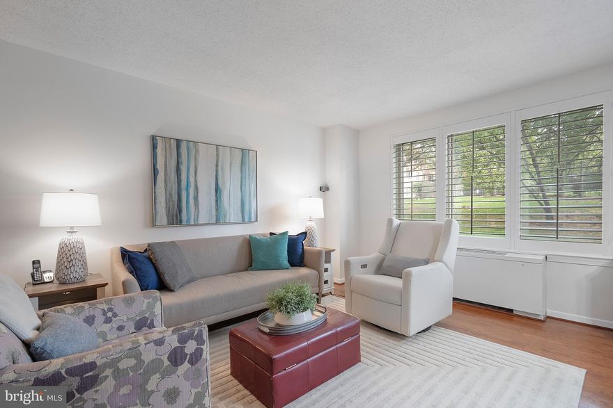 Beautifully refreshed condo in the heart of Lyon Village, where natural light, thoughtful updates, and a prime courtyard view combine for the perfect blend of comfort and convenience. Enjoy one of the best locations in the building—a bright, quiet setting overlooking the landscaped courtyard and pool. Inside, you’ll find new hardwood floors, fresh paint, and a remodeled kitchen (2012) with granite countertops, stainless steel appliances, and a brand-new refrigerator. The walk-in pantry/closet features new tile flooring and ample storage. The bathroom was updated with a new vanity and toilet in 2021.
The spacious bedroom provides a peaceful retreat with a generous closet, and the bathroom offers timeless finishes and a clean, updated look. Condo fee includes all utilities (except internet, cable, and phone). Community amenities include a pool, fitness center, picnic area, club room, secure bike storage, washer/dryers on each floor, on-site management, and resident parking. Located just 0.8 miles to Clarendon Metro with easy access to Route 66, GW Parkway, D.C., and Amazon HQ2. Walk to MOM’s, Whole Foods, The Italian Store, and Starbucks—with Sprouts Farmers Market coming soon! This updated, sun-filled condo delivers comfort, convenience, and unbeatable location—all in one perfect package.